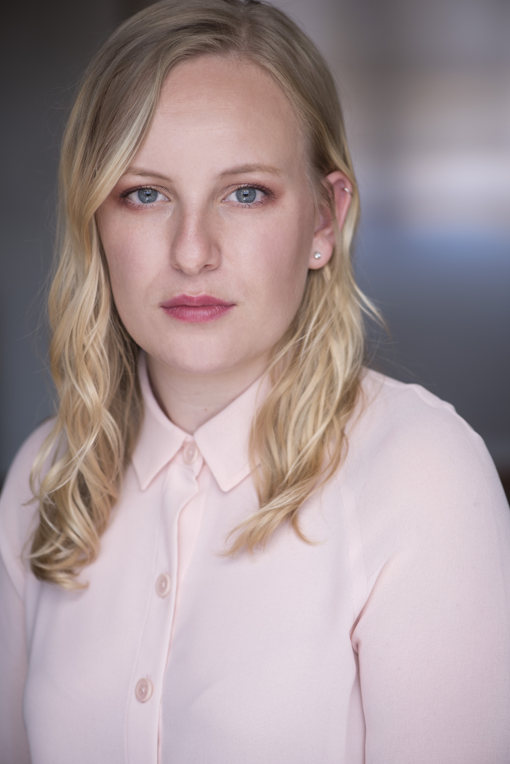 Chloe Greenfield Blonde Actor Headshot Pink Shirt Serious Quirky